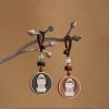 Ebony Wood Avalokitesvara Keychain with Om Mani Padme Hum Ebony Wood Avalokitesvara Keychain with Om Mani Padme Hum