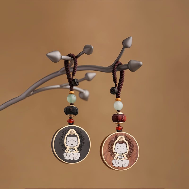 Ebony Wood Avalokitesvara Keychain with Om Mani Padme Hum Ebony Wood Avalokitesvara Keychain with Om Mani Padme Hum