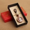 Ebony Wood Avalokitesvara Keychain with Om Mani Padme Hum Ebony Wood Avalokitesvara Keychain with Om Mani Padme Hum