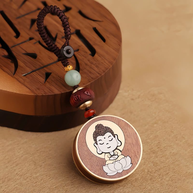 Ebony Wood Avalokitesvara Keychain with Om Mani Padme Hum Ebony Wood Avalokitesvara Keychain with Om Mani Padme Hum