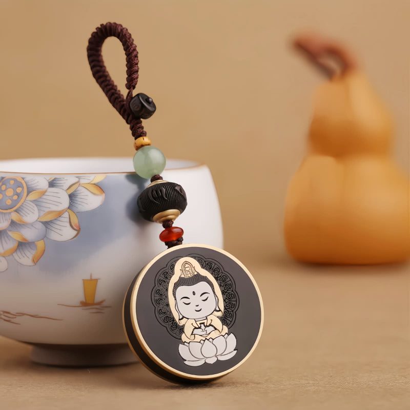Ebony Wood Avalokitesvara Keychain with Om Mani Padme Hum Ebony Wood Avalokitesvara Keychain with Om Mani Padme Hum