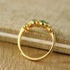 Anillo de Prosperidad en Jade Hetian y Plata 925 con Flor Dorada Hetian Jade Prosperity Ring in 925 Silver with Gold Flower