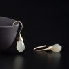 Pendientes de Jade Hetian y Plata: Elegancia en Flor de Magnolia Hetian Jade Magnolia Drop Earrings