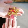 Brosche „Jahr der Schlange“ aus Kupfer mit Glücksbeutel Copper Year of the Snake Brooch with Lucky Fortune Bag