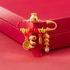 Brosche „Jahr der Schlange“ aus Kupfer mit Glücksbeutel Copper Year of the Snake Brooch with Lucky Fortune Bag