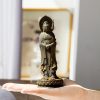 Rusty Iron Powder Kwan Yin Statue - Three-Faced Compassion Symbol Rusty Iron Powder Kwan Yin Statue - Three-Faced Compassion Symbol
