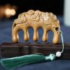 Green Sandalwood Plum Blossom Koi Fish Engraved Comb Green Sandalwood Plum Blossom Koi Fish Engraved Comb