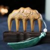Green Sandalwood Plum Blossom Koi Fish Engraved Comb Green Sandalwood Plum Blossom Koi Fish Engraved Comb