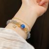 Natural Moonstone Flower Charm Bracelet Natural Moonstone Flower Charm Bracelet