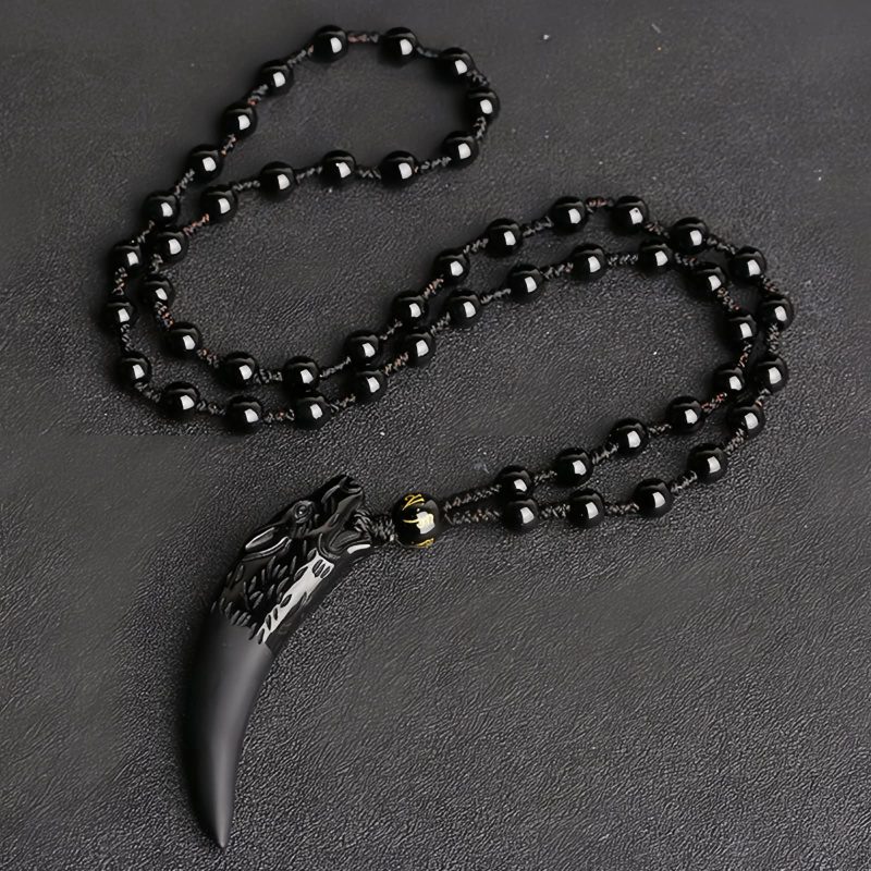 Natural Ice Obsidian Wolf Tooth Courage Pendant Natural Ice Obsidian Wolf Tooth Courage Pendant