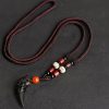 Natural Ice Obsidian Wolf Tooth Courage Pendant Natural Ice Obsidian Wolf Tooth Courage Pendant