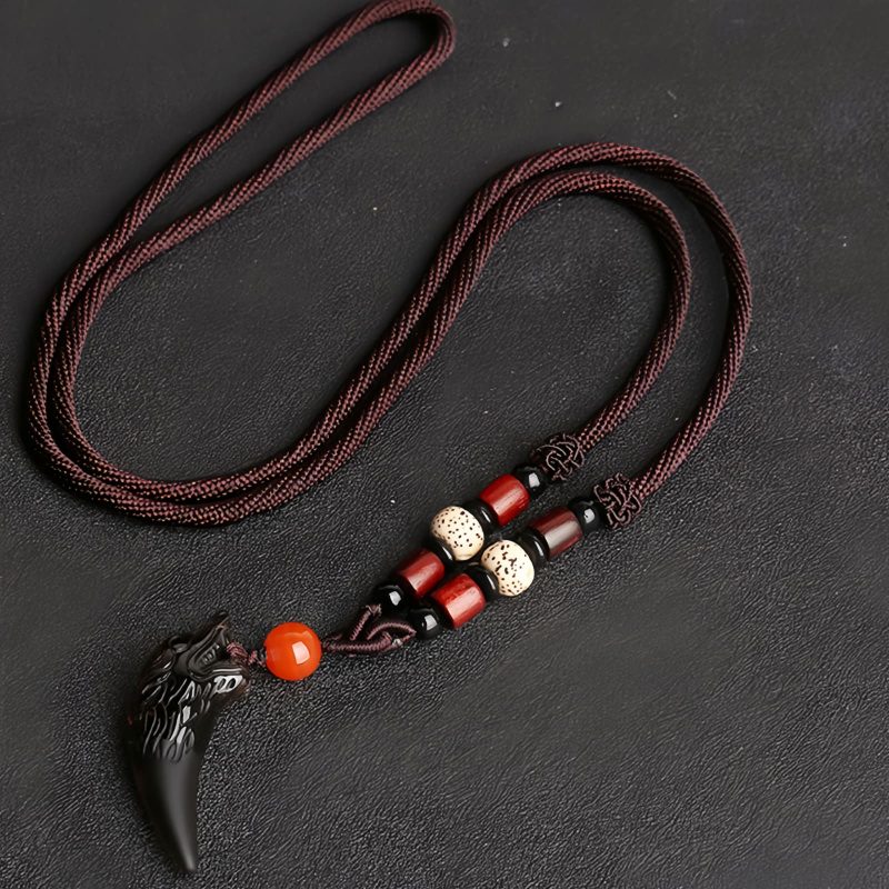 Natural Ice Obsidian Wolf Tooth Courage Pendant Natural Ice Obsidian Wolf Tooth Courage Pendant
