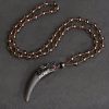 Natural Ice Obsidian Wolf Tooth Courage Pendant Natural Ice Obsidian Wolf Tooth Courage Pendant