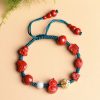Natural Cinnabar Laughing Buddha Bracelet Natural Cinnabar Laughing Buddha Bracelet
