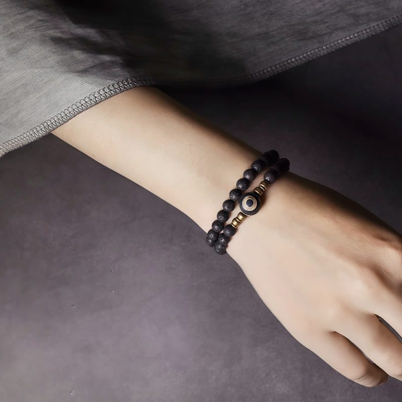 Vintage Lava Rock Healing Bracelet with Three-eyed Dzi Bead Vintage Lava Rock Healing Bracelet with Three-eyed Dzi Bead
