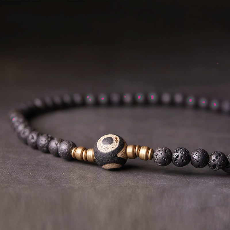 Vintage Lava Rock Healing Bracelet with Three-eyed Dzi Bead Vintage Lava Rock Healing Bracelet with Three-eyed Dzi Bead