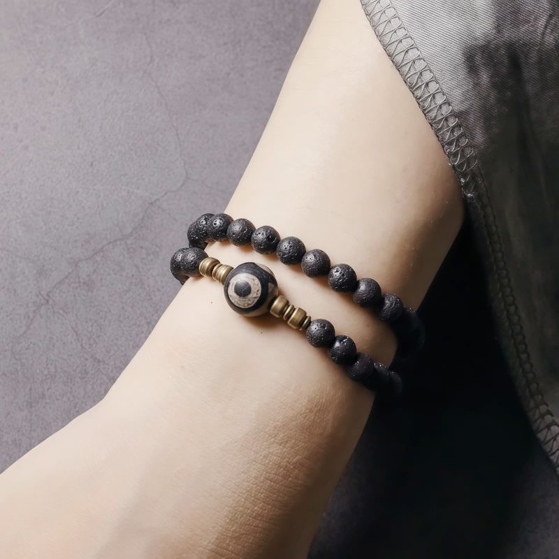 Vintage Lava Rock Healing Bracelet with Three-eyed Dzi Bead Vintage Lava Rock Healing Bracelet with Three-eyed Dzi Bead