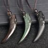 Natural Obsidian Wolf Tooth Strength Pendant Natural Obsidian Wolf Tooth Strength Pendant