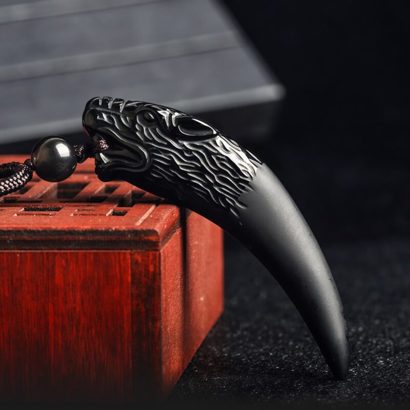 Natural Obsidian Wolf Tooth Strength Pendant Natural Obsidian Wolf Tooth Strength Pendant