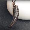 Natural Obsidian Wolf Tooth Strength Pendant Natural Obsidian Wolf Tooth Strength Pendant