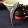 Natural Obsidian Wolf Tooth Strength Pendant Natural Obsidian Wolf Tooth Strength Pendant