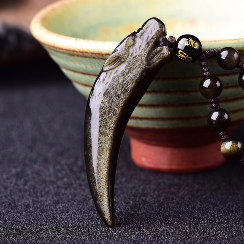 Natural Obsidian Wolf Tooth Strength Pendant Natural Obsidian Wolf Tooth Strength Pendant