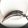 Natural Obsidian Wolf Tooth Strength Pendant Natural Obsidian Wolf Tooth Strength Pendant